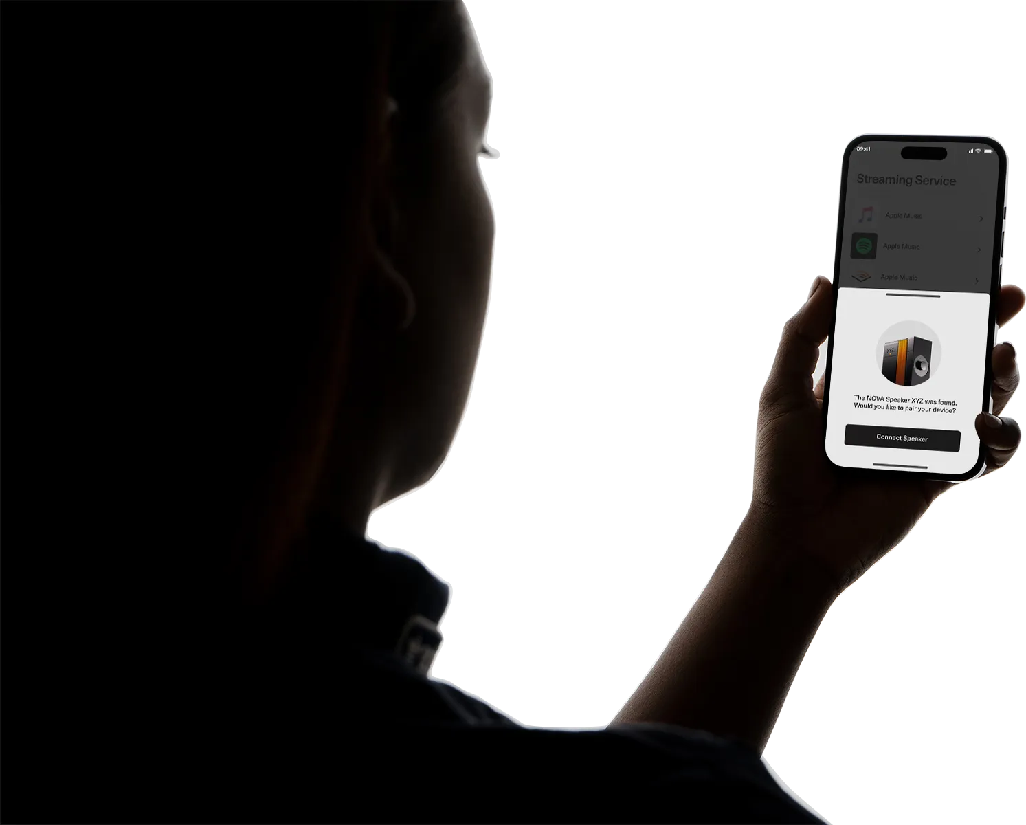 Close up of a woman holding an iPhone showing a speaker app.